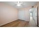 Bedroom with closet, hardwood flooring, and neutral wall color at 2447 Ecuadorian Way # 11, Clearwater, FL 33763