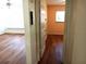 View of the living room featuring hardwood floors and a ceiling fan at 2447 Ecuadorian Way # 11, Clearwater, FL 33763