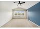 Spacious bedroom boasts lots of natural light and a modern ceiling fan at 2542 Glenrise Pl, Wesley Chapel, FL 33544