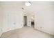 Bedroom with neutral walls and carpet and direct access to ensuite bath at 2542 Glenrise Pl, Wesley Chapel, FL 33544