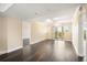Bright living room with hardwood floors, slider doors and neutral walls at 3211 W Swann Ave # 605, Tampa, FL 33609