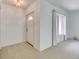 Entryway featuring neutral carpet, a front door, and a sidelight at 339 Club Manor Dr, Sun City Center, FL 33573