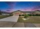 Charming single story home showcasing a well manicured lawn and a long driveway at 339 Club Manor Dr, Sun City Center, FL 33573