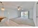 Large living room with sliding doors leading to outdoor patio at 339 Club Manor Dr, Sun City Center, FL 33573