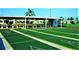 Outdoor shuffleboard courts offer a recreational activity in a community setting at 339 Club Manor Dr, Sun City Center, FL 33573