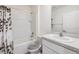 Clean bathroom featuring shower-tub combo, neutral walls, and modern vanity at 33922 Jasper Stone Dr, Wesley Chapel, FL 33543