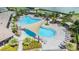 Overhead view of a resort-style community pool with ample seating and shade. Great for relaxation at 33922 Jasper Stone Dr, Wesley Chapel, FL 33543