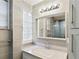 The bathroom features modern fixtures, including a stylish vanity and mirror at 345 21St S Ave, St Petersburg, FL 33705