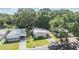 Charming home with a well-manicured lawn and driveway at 3542 Castle Dr, Zephyrhills, FL 33540