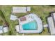 Aerial shot of the community swimming pool featuring a lounge area and sun deck for residents at 3542 Castle Dr, Zephyrhills, FL 33540