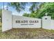 Shady Oaks Resident Owned community entrance sign with manicured landscaping at 3542 Castle Dr, Zephyrhills, FL 33540