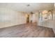 Bright and airy living room with modern flooring and open layout at 3542 Castle Dr, Zephyrhills, FL 33540