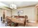 Dining room featuring wood flooring, a chandelier, and elegant decor at 36750 Us 19 N # 08204, Palm Harbor, FL 34684
