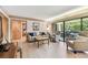 Living room features a sliding glass door to patio, and elegant decor at 36750 Us 19 N # 08204, Palm Harbor, FL 34684