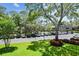 A well-maintained parking lot with ample parking spaces available to residents and visitors at 36750 Us 19 N # 08204, Palm Harbor, FL 34684