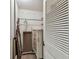 Walk-in closet features a rack, shelves, full-length mirror, and a dresser with drawers for storage at 36750 Us 19 N # 08204, Palm Harbor, FL 34684