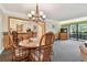 Light and bright condo with open floor plan dining room and sliding glass doors to patio at 36750 Us 19 N # 15309, Palm Harbor, FL 34684
