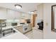 Traditional kitchen with white cabinets, tiled floor, and white appliances at 36750 Us 19 N # 15309, Palm Harbor, FL 34684