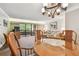 Comfortable living room with sliding glass doors leading to a private outdoor patio at 36750 Us 19 N # 15309, Palm Harbor, FL 34684