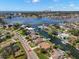 Aerial view of the waterfront home, highlighting canal access, city views and neighborhood at 3932 Shore Acres Ne Blvd, St Petersburg, FL 33703