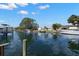 Picturesque waterfront view of canal homes and boats at 3932 Shore Acres Ne Blvd, St Petersburg, FL 33703