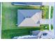 Top-down aerial view of a home with a well-manicured lawn and landscaping at 3952 Aldea Way, Wesley Chapel, FL 33543