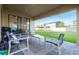 Outdoor patio featuring outdoor furniture, brick flooring, and views of the backyard at 3952 Aldea Way, Wesley Chapel, FL 33543