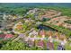 Birds eye view of neighborhood with waterfront homes, each featuring its own pond, for a luxurious living experience at 4012 Wellington Pkwy, Palm Harbor, FL 34685