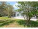 Landscaped backyard with pool at 4012 Wellington Pkwy, Palm Harbor, FL 34685