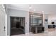 Foyer view features entry to office and glimpses of kitchen in the distance at 4012 Wellington Pkwy, Palm Harbor, FL 34685