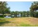 Pond with fountain and landscaping at 4012 Wellington Pkwy, Palm Harbor, FL 34685
