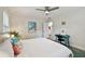Bright bedroom with a comfortable bed, desk, and en-suite bathroom, providing a relaxing and functional space at 4324 S Clark Ave, Tampa, FL 33611