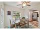 Comfortable dining area with backyard view is conveniently open to the updated kitchen at 4324 S Clark Ave, Tampa, FL 33611
