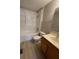 Bright bathroom featuring a shower and bath combination with a standard vanity at 4617 Ashburn Square Dr, Tampa, FL 33610