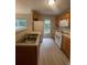 Efficient kitchen with stainless steel appliances and lots of natural light at 4617 Ashburn Square Dr, Tampa, FL 33610