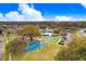 Overhead view of the community park with basketball courts, pool, and parking at 4921 Wessex Way, Land O Lakes, FL 34639
