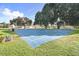 Well-maintained community basketball courts surrounded by lush landscaping at 4921 Wessex Way, Land O Lakes, FL 34638