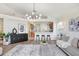 Bright living room flows into the kitchen and offers a spacious, open concept at 4921 Wessex Way, Land O Lakes, FL 34638