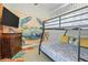 Unique bedroom with fun mural and bunkbeds at 501 Janice Pl, Indian Rocks Beach, FL 33785