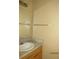 Bathroom with a single sink vanity, framed mirror, and neutral walls at 5110 Sunridge Palms Dr, Tampa, FL 33617