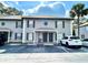 Well-maintained condo building with covered entries, and convenient parking in a serene neighborhood at 5110 Sunridge Palms Dr, Tampa, FL 33617