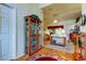 Inviting interior view of a living room showcasing an arched doorway and decorative furnishings at 550 Salmon Ct, Oldsmar, FL 34677