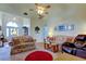Inviting living room with comfortable seating, ample natural light, and neutral decor at 550 Salmon Ct, Oldsmar, FL 34677