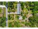Aerial view of the home showcasing the roof, lot, and surrounding neighborhood at 6104 Palm Ave, Gibsonton, FL 33534