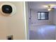 Living room with tile floors and an Ecobee thermostat at 6825 Hammock Rd, Port Richey, FL 34668