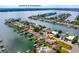 Aerial view of waterfront property with canal access near Downtown St Petersburg FL at 710 116Th Ave, Treasure Island, FL 33706