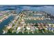 Aerial view of the neighborhood with waterfront homes and boating access at 710 116Th Ave, Treasure Island, FL 33706