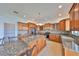 Kitchen featuring granite countertops, stainless steel appliances, and center island at 710 116Th Ave, Treasure Island, FL 33706