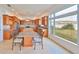 Spacious kitchen with granite countertops, center island, and stainless steel appliances at 710 116Th Ave, Treasure Island, FL 33706