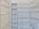 Spacious walk-in closet features an adjustable storage system with shelves and wire racks at 710 116Th Ave, Treasure Island, FL 33706